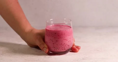 Raspberry smoothie in glass jar. Healthy refreshed homemade beverage. Stock Footage 194105141