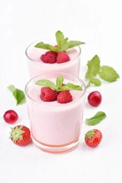 Raspberry smoothie in glass Stock Photos