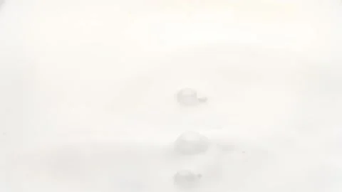 Raspberry splashing in to the milk. Stock Footage 145813392