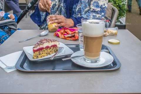 Raspberry stracciatella cake and caramel Latte macchiato. mcdonald's Stock Photos