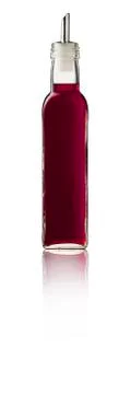 Raspberry Syrup bottle on white background with reflection. Foto stock