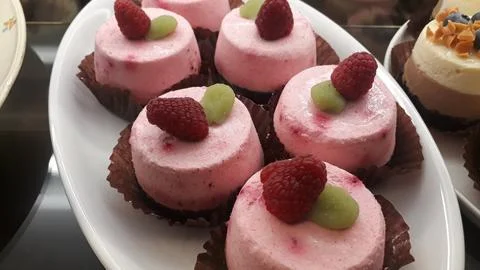 Raspberry-Topped Mini Cheesecakes Stock Photos