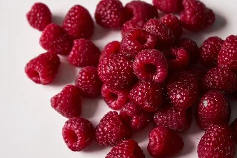 Raspberry on a white background, close-up red Stock Photos