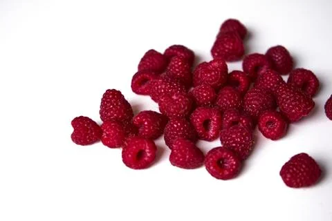 Raspberry on a white background, close-up red Stock Photos