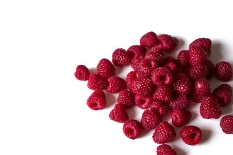 Raspberry on a white background, close-up red Stock Photos