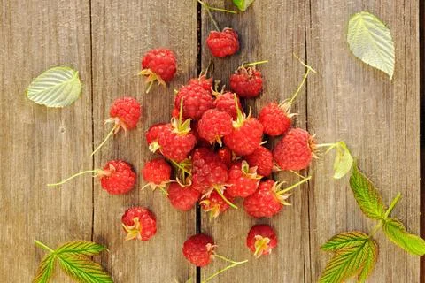 Raspberry on wooden table Raspberry with leafs on wooden table Copyright: ... Foto stock
