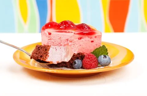Raspberry yoghurt cake garnished with berries Stock Photos