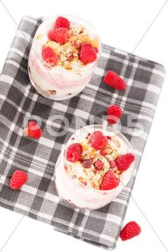 Raspberry yoghurt desserts from top Stock Photos