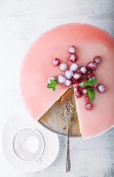 Raspberry yogurt cake with berries on a table. Stock Photos