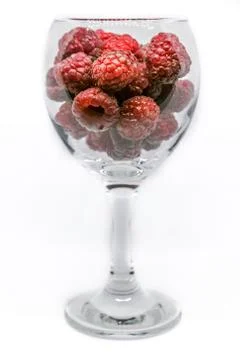 Raspberryes in Wine Glass Stock Photos