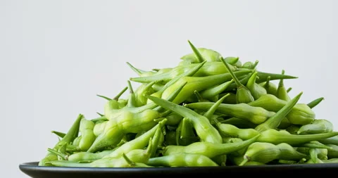 Rat tail radish (Raphanus sativus var. caudatus) on a plate. Stock Footage 281836551