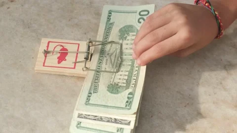 Rat trap hand picking up money bitcoin cash dollar symbol economy Stock Footage 221566248