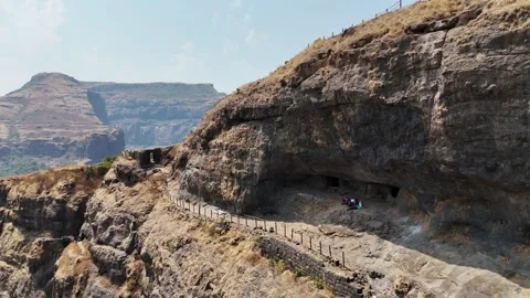 Ratangad fort caves in the cliff face aerial Maharashtra India 스톡 동영상 341127461