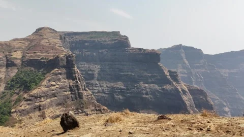 Ratangad table mountain cliff aerial in the Sahyadri Maharashtra India Stock Footage 341127090