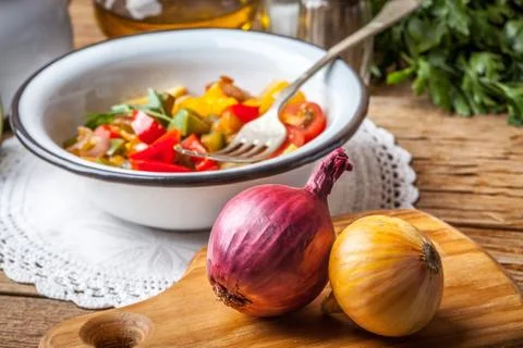 Ratatouille on a rustic table. Stock Photos