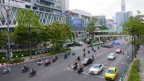 Ratchaprasong intersection and Central World with casual traffic, Bangkok Stock Footage 231471060