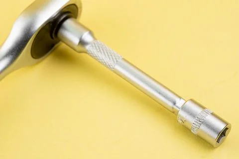 Ratchet with extended socket and bit adapter Stock Photos