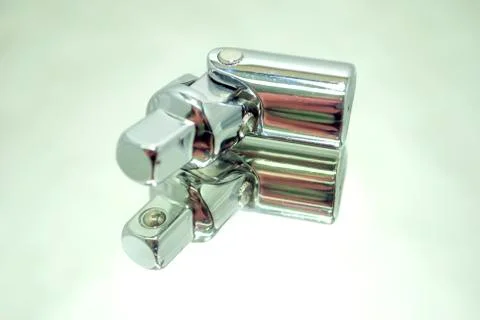 Ratchet socket wrench angle coupling closeup on mirror Stock Photos