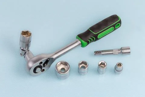 Ratchet wrench with different hexagonal sockets and adapters 스톡 사진