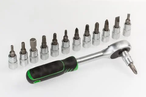 Ratchet wrench with inserted crosspoint shape bit, interchangeable bits set Foto stock