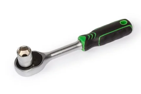Ratchet wrench with inserted hexagonal socket on a white background 写真素材