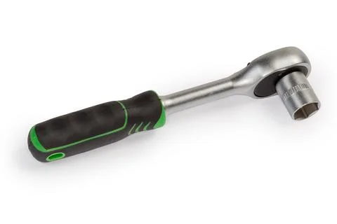 Ratchet wrench with inserted hexagonal socket on a white background 写真素材