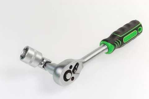Ratchet wrench with inserted hexagonal socket via gimbal joint adapter 写真素材