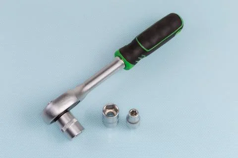 Ratchet wrench with inserted hexagonal socket and two interchangeable sockets 写真素材