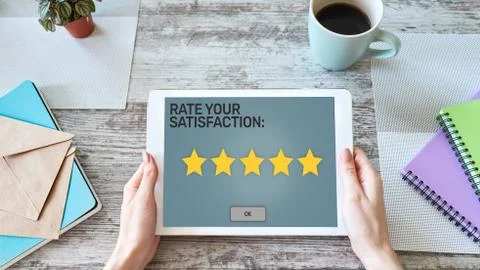 Rate your experience. Customer satisfaction review. Five star on device screen 스톡 사진