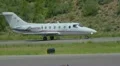 Ratheon 400A private jet taxis and takes off from Aspen Airport - 3 HD видео футажи