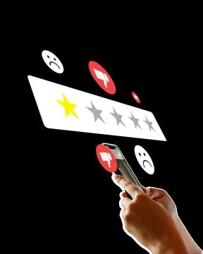Rating system with user interacting on phone displaying stars and feedback Stock Photos