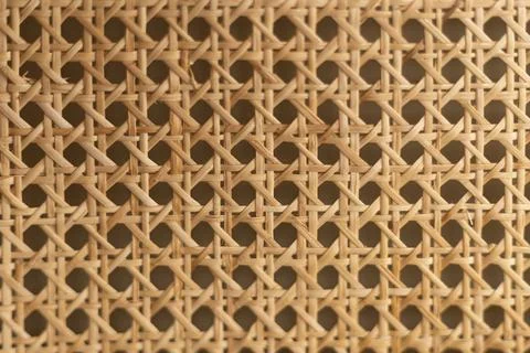 Rattan cane webbing texture with woven octagonal wicker pattern close up Foto stock