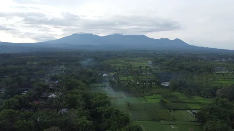 Raung active volcano East Java in clouds film from drone - top view Stock Footage 230957128