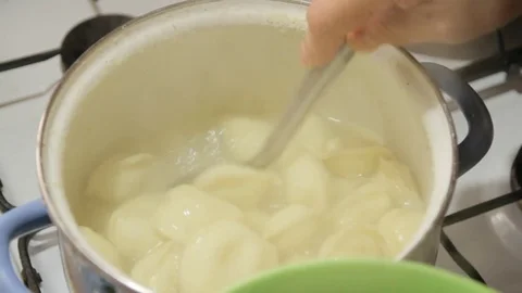 Ravioli being cooked in water Stock Footage 72366964