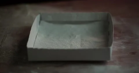 Ravioli drop on flour 2 Stock Footage 131856360