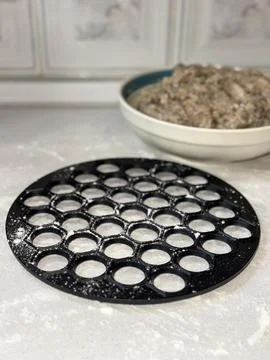 Ravioli Mold with Flour on Table Stock Photos