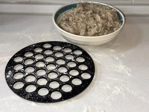 Ravioli Mold with Flour on Table Stock Photos