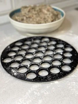 Ravioli Mold with Flour on Table Stock Photos