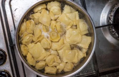 Ravioli in sauce pan Stock Photos