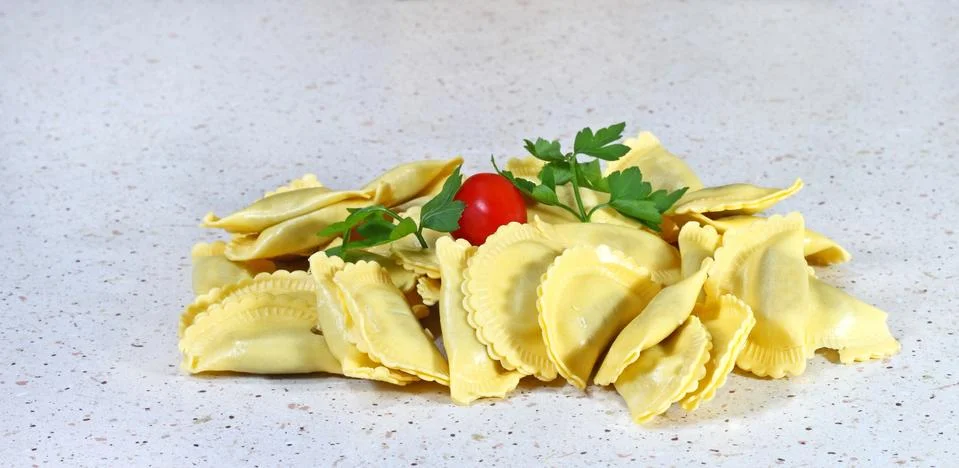 Ravioli on table Stock Photos