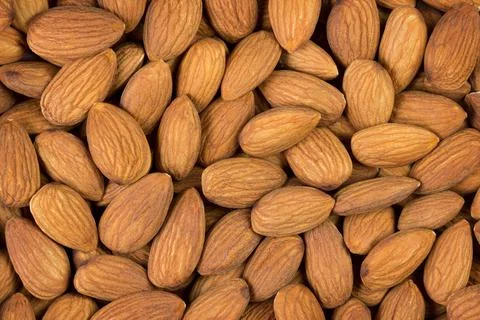 Raw almods as background Stock Photos