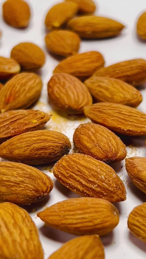 Raw almond nuts on white background close up Stock Footage 336471320