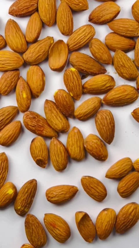 Raw almond nuts on white background close up Stock Footage 336471324
