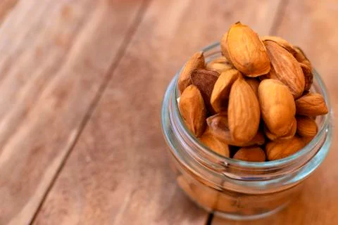Raw almonds inside a pot, Stock Photos
