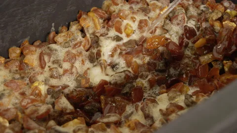 Raw amber washing process Video stock 138127458