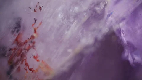Raw amethyst under microscope, revealing intricate crystal structures, vibrant Stock Footage 278181263