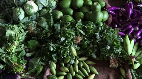 Raw and fresh vegetables piled in a shop for selling Stock Footage 118347970