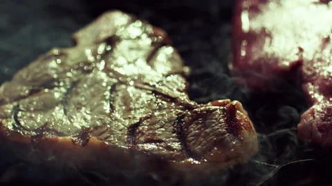 Raw and Fried Beef Black Angus on Bbq Grid Closeup Stock Footage 156895808
