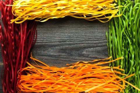 Raw and multicolored pasta Stock Photos
