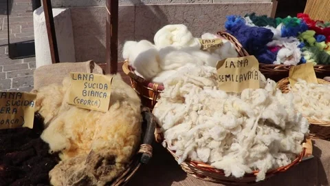 Raw and Semi-Washed Wool Baskets at a Medieval Historical Market 스톡 동영상 332625861
